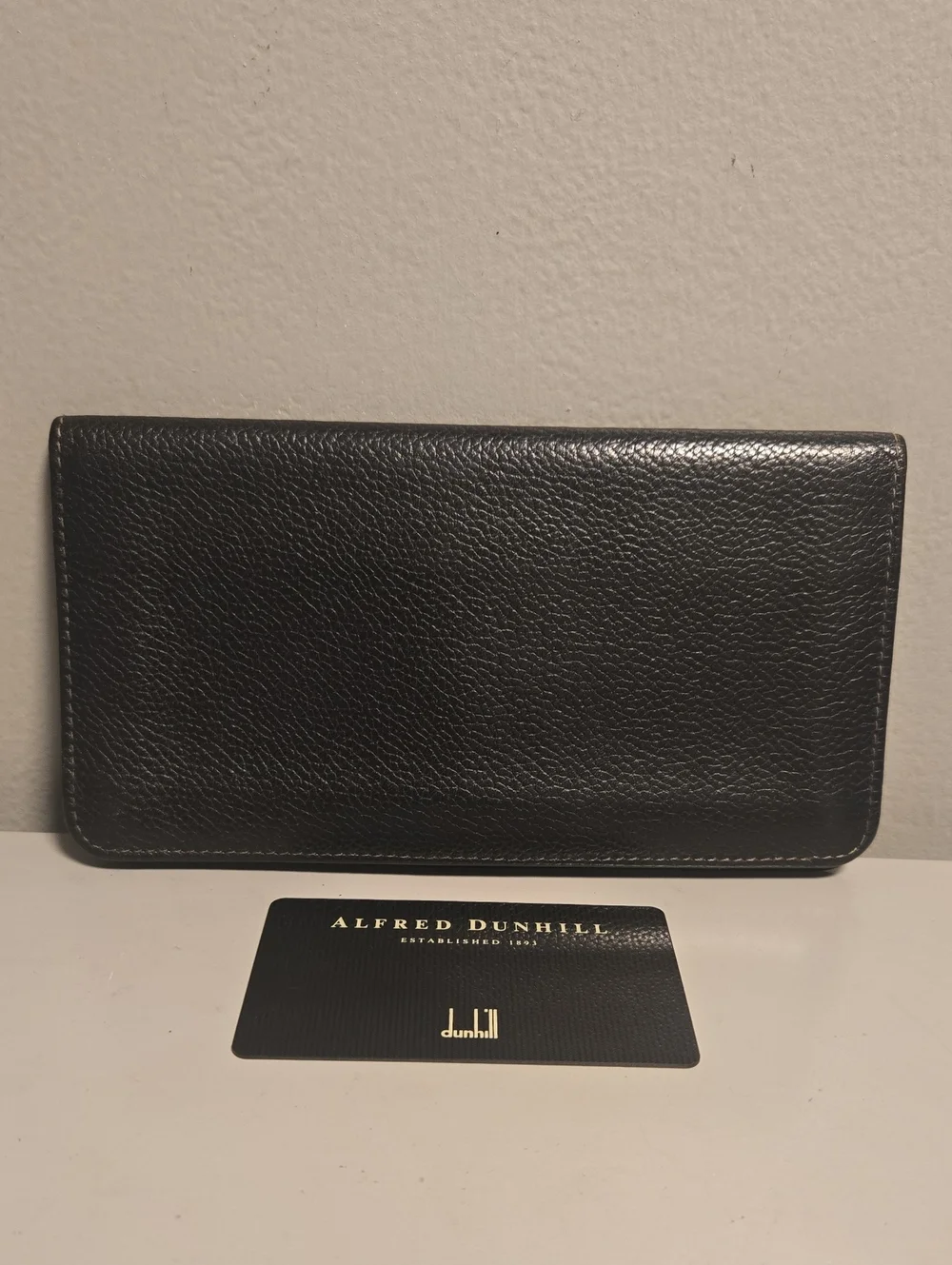 Dunhill Black Pebble Leather Continental Wallet with Gold Accent